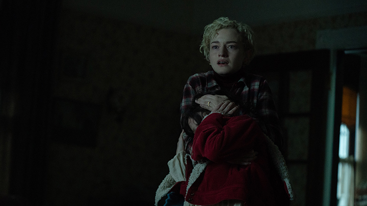 Wolf Man (2025) film still of actors Julia Garner, and Matilda Firth